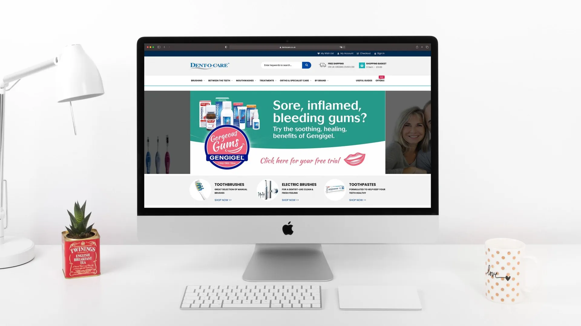 Dent-O-Care website homepage featuring the Gorgeous Gums campaign, shown on an iMac